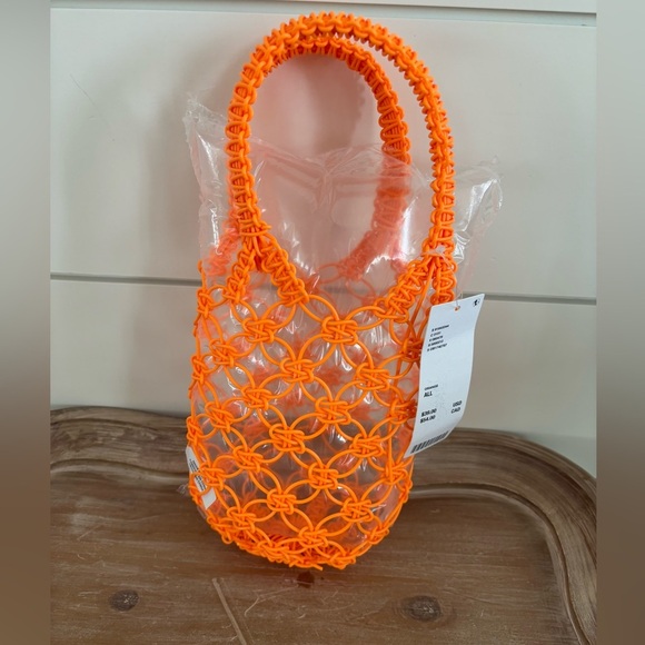 Urban Outfitters Handbags - Urban Outfitters Mesh Bucket Bag In Orange NWT
